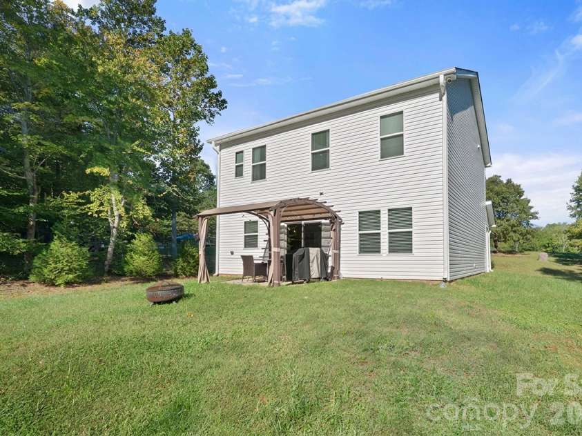197 Winding Cedar Drive, Statesville, NC 28677.  MLS# CAR4431468, YatesRealty ID 55366. 1.01 Acre