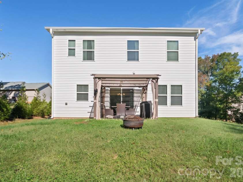 197 Winding Cedar Drive, Statesville, NC 28677.  MLS# CAR4431468, YatesRealty ID 55366. BackYard