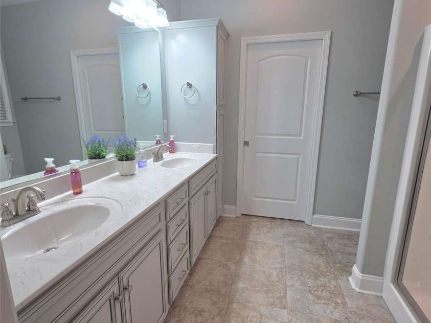 101 Parkview Drive, Yadkinville, NC 27055.  MLS# CAR4430843, YatesRealty ID 55376. Double vanity en suite bathroom