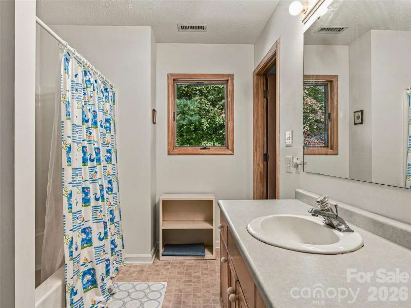 266 Stone Drive, Brevard, NC 28712.  MLS# CAR4430757, YatesRealty ID 55378. 