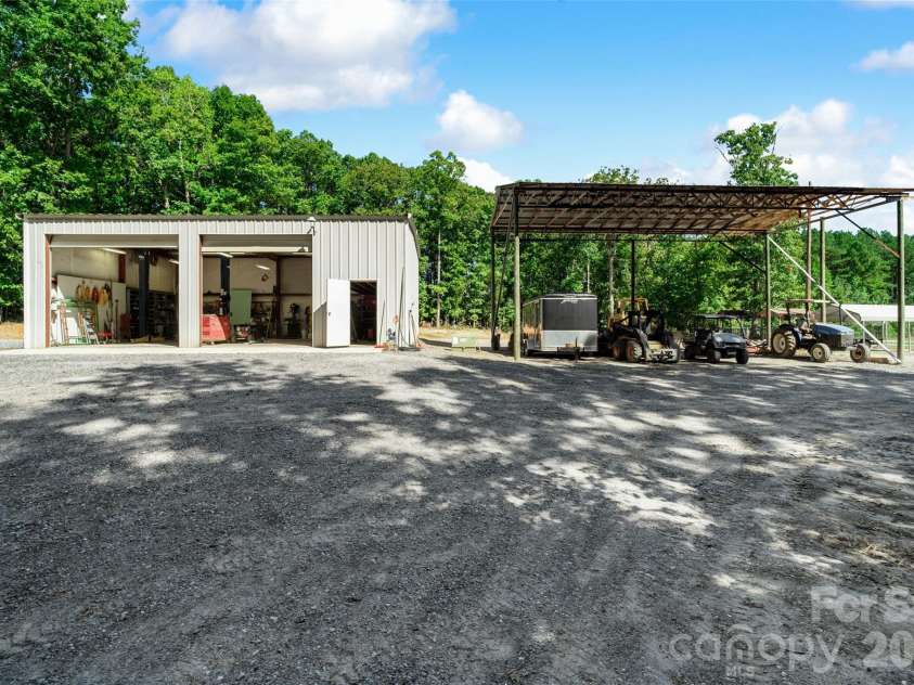 996 Beamguard Road, Clover, SC 29710.  MLS# CAR4430042, YatesRealty ID 55385. 2 Bay Workshop [40.5ft x 30.3ft] and Pole Barn [46.8ft x 27.7ft]