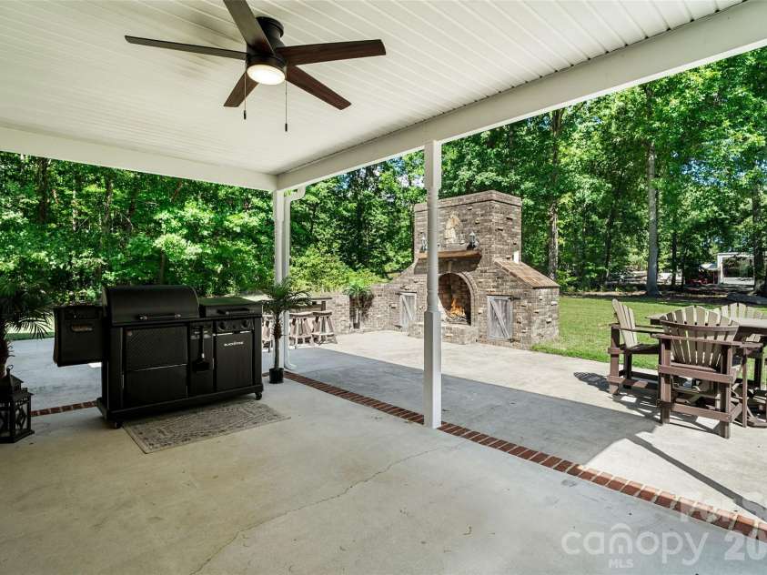 996 Beamguard Road, Clover, SC 29710.  MLS# CAR4430042, YatesRealty ID 55385. Back covered patio [18.8ft x 10.4ft]