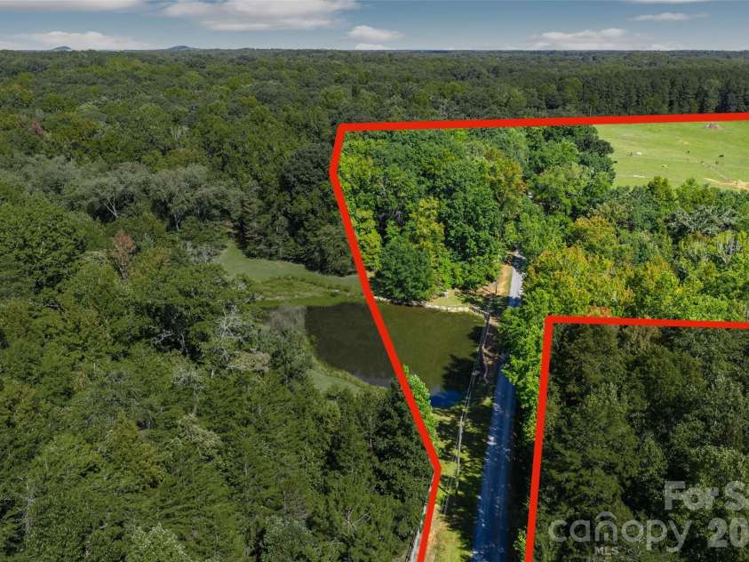 996 Beamguard Road, Clover, SC 29710.  MLS# CAR4430042, YatesRealty ID 55385. Stocked pond with bream and bass