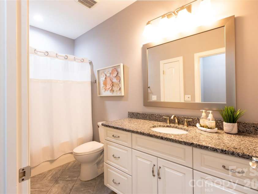 8242 Symphony Court, Denver, NC 28037.  MLS# CAR4429883, YatesRealty ID 55386. Main level guest bath - full