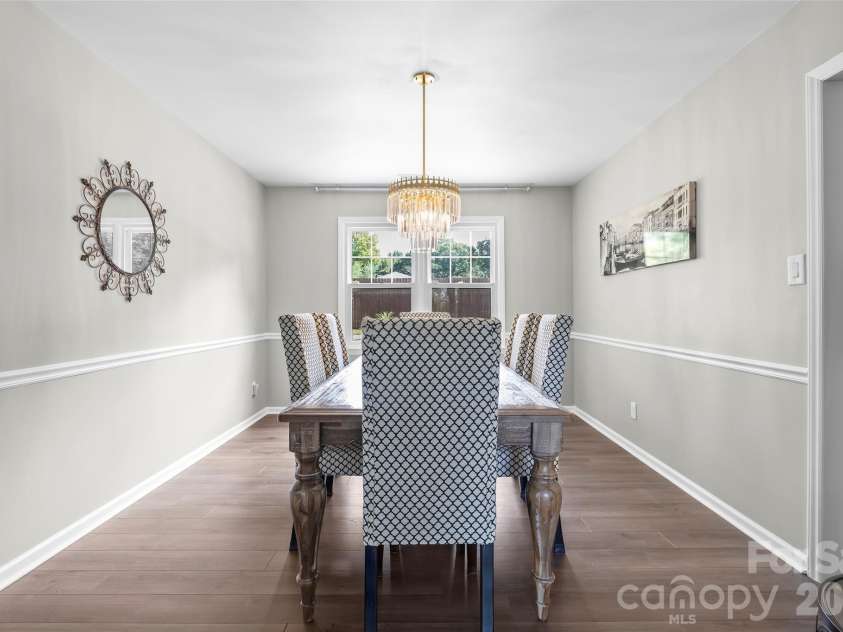 241 Linville Drive, Matthews, NC 28105.  MLS# CAR4429436, YatesRealty ID 55390. 