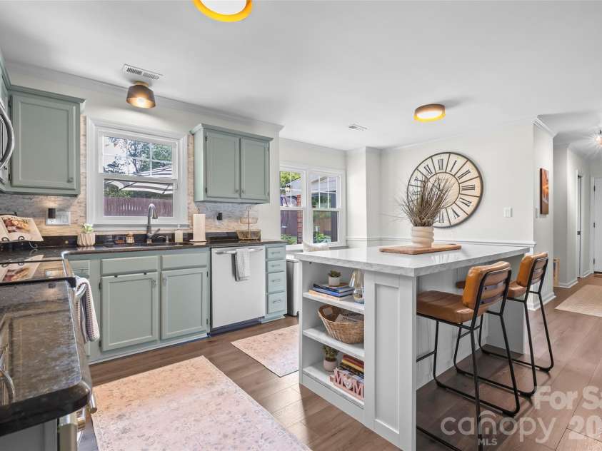 241 Linville Drive, Matthews, NC 28105.  MLS# CAR4429436, YatesRealty ID 55390. 
