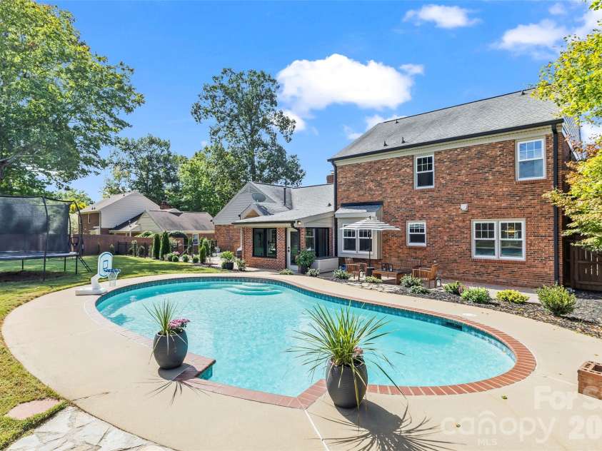 241 Linville Drive, Matthews, NC 28105.  MLS# CAR4429436, YatesRealty ID 55390. 