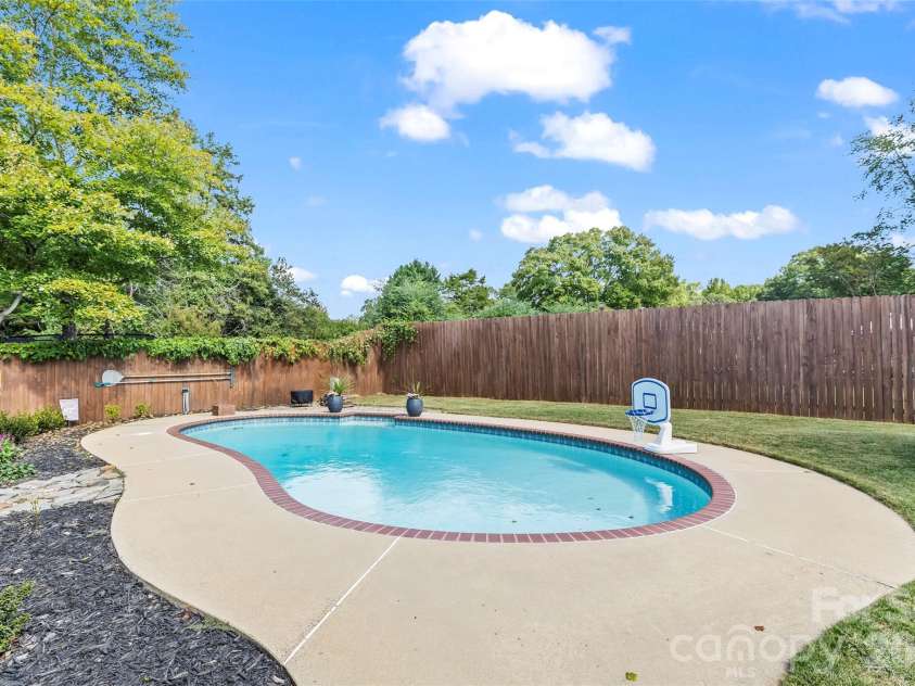 241 Linville Drive, Matthews, NC 28105.  MLS# CAR4429436, YatesRealty ID 55390. 