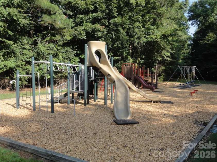 241 Linville Drive, Matthews, NC 28105.  MLS# CAR4429436, YatesRealty ID 55390. 