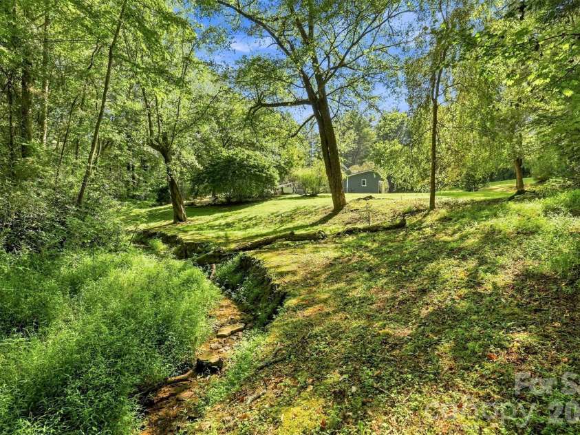406 Friendship Lane, Pisgah Forest, NC 28768.  MLS# CAR4425881, YatesRealty ID 55409. 