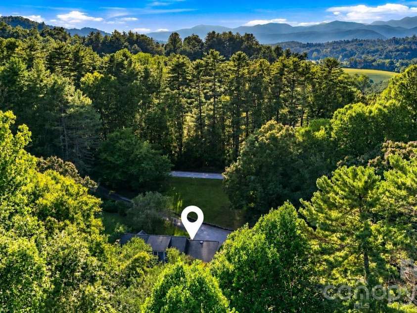 406 Friendship Lane, Pisgah Forest, NC 28768.  MLS# CAR4425881, YatesRealty ID 55409. 