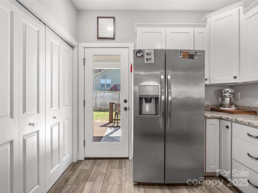 2 Half Moon Drive, Swannanoa, NC 28778.  MLS# CAR4228596, YatesRealty ID 5541. Back Door to covered porch and Backyard