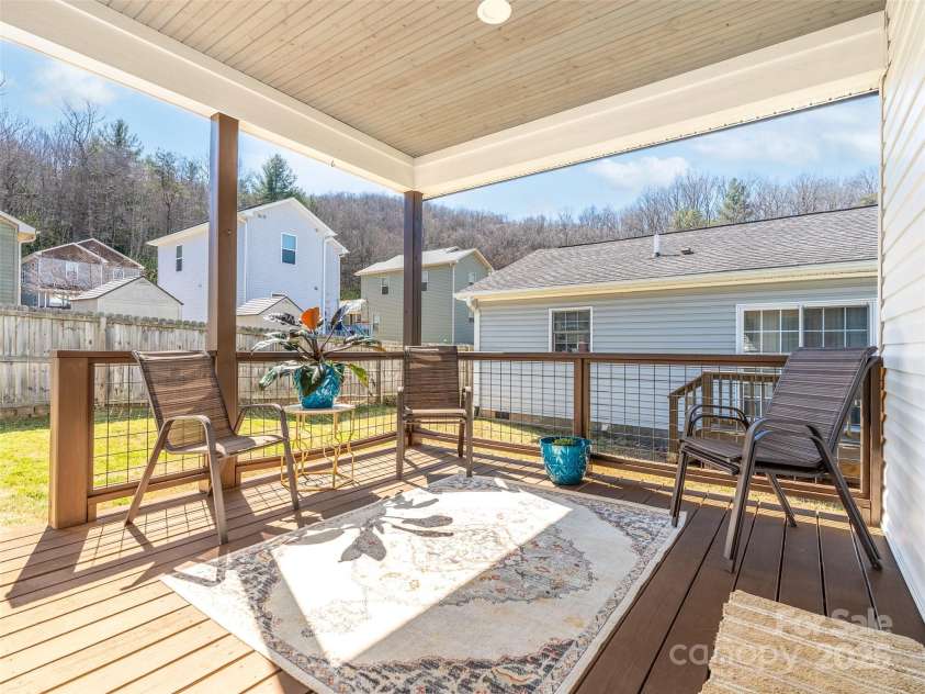 2 Half Moon Drive, Swannanoa, NC 28778.  MLS# CAR4228596, YatesRealty ID 5541. Covered Back Porch