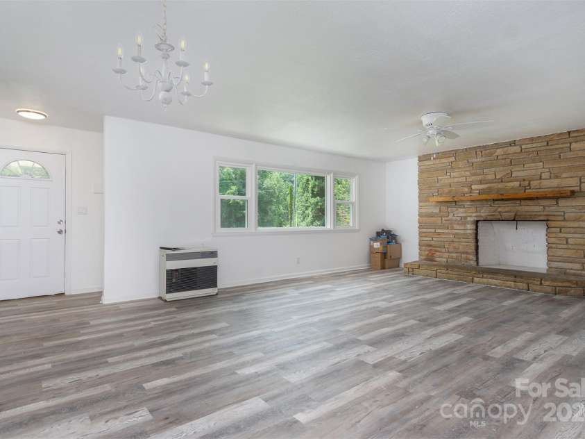 468 Deer Park Lake Road, Spruce Pine, NC 28777.  MLS# CAR4068097, YatesRealty ID 5542. Living room unit 1