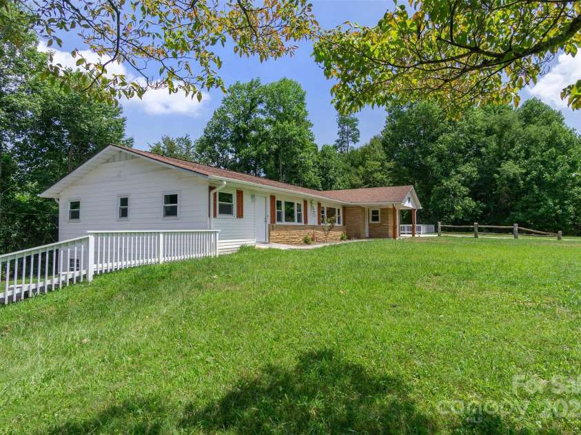 468 Deer Park Lake Road, Spruce Pine, NC 28777.  MLS# CAR4068097, YatesRealty ID 5542. Side view of property