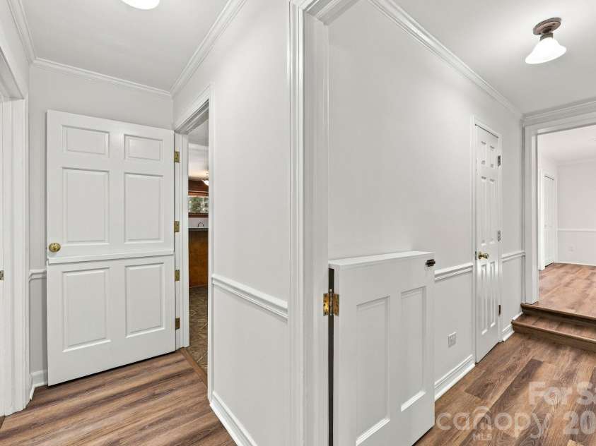 123 Hillside Avenue, Concord, NC 28025.  MLS# CAR4432576, YatesRealty ID 55421. Hallway with pony door