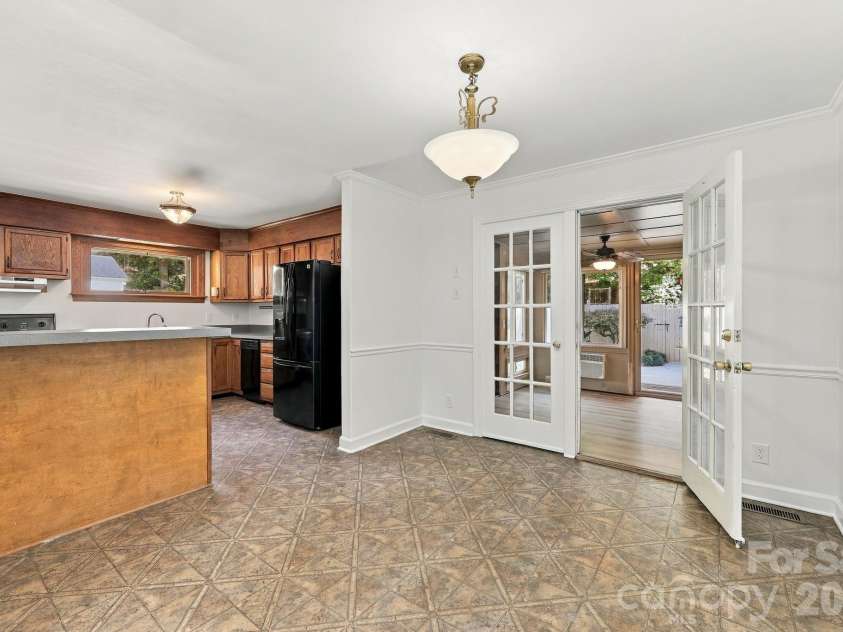 123 Hillside Avenue, Concord, NC 28025.  MLS# CAR4432576, YatesRealty ID 55421. Kitchen with breakfast bar and Dining Area