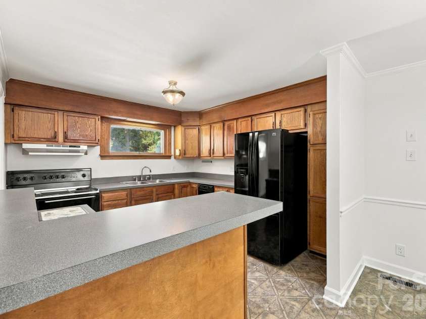 123 Hillside Avenue, Concord, NC 28025.  MLS# CAR4432576, YatesRealty ID 55421. Kitchen with Fridge