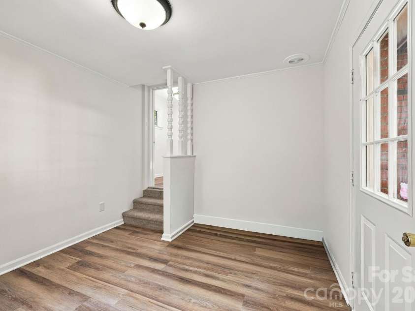 123 Hillside Avenue, Concord, NC 28025.  MLS# CAR4432576, YatesRealty ID 55421. Laundry room off primary