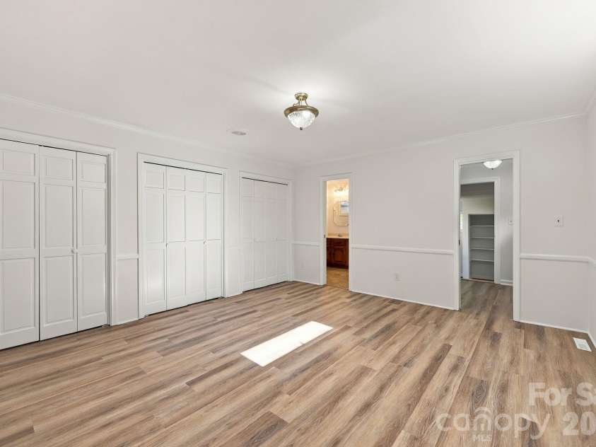 123 Hillside Avenue, Concord, NC 28025.  MLS# CAR4432576, YatesRealty ID 55421. Primary bedroom with closet wall