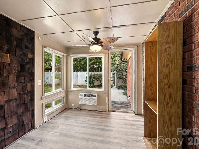 123 Hillside Avenue, Concord, NC 28025.  MLS# CAR4432576, YatesRealty ID 55421. Sun Room Off Dining Area