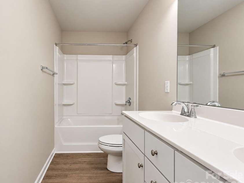 2647 Dellinger Drive, Charlotte, NC 28269.  MLS# CAR4426888, YatesRealty ID 55422. Upper bathroom