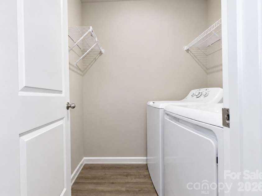 2647 Dellinger Drive, Charlotte, NC 28269.  MLS# CAR4426888, YatesRealty ID 55422. Upstairs laundry room