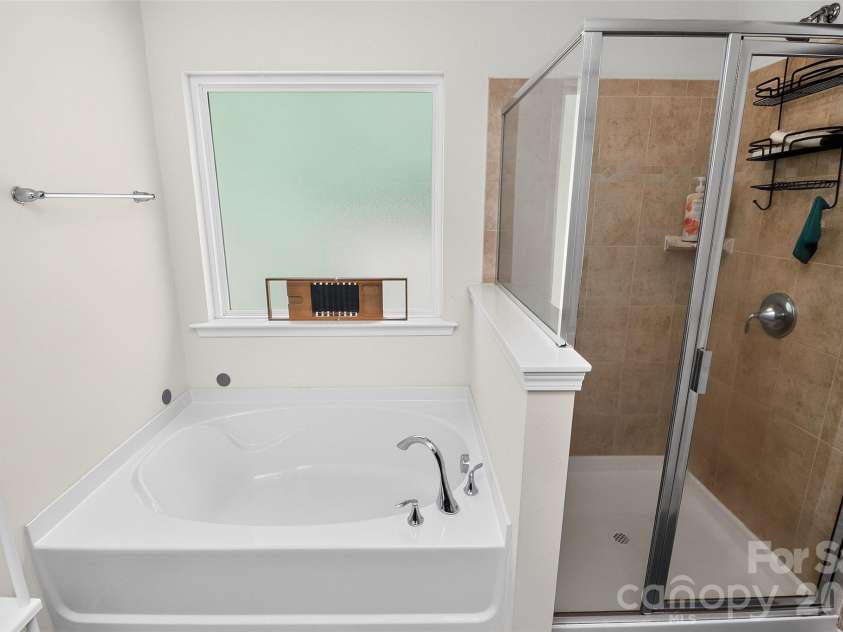 78066 Rillstone Drive, Lancaster, SC 29720.  MLS# CAR4431291, YatesRealty ID 55424. En suite primary bathroom
