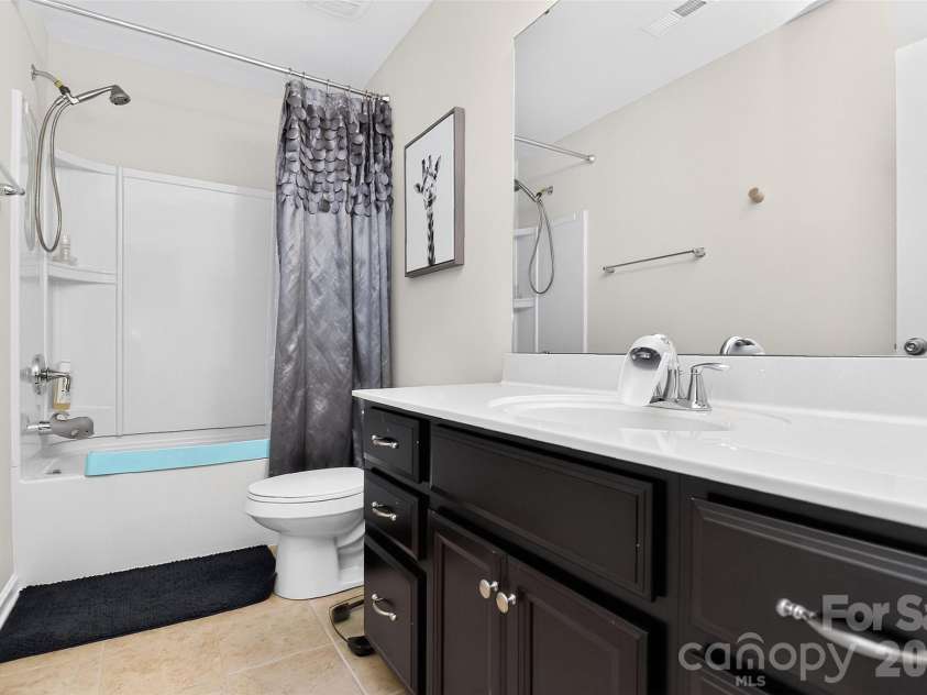 78066 Rillstone Drive, Lancaster, SC 29720.  MLS# CAR4431291, YatesRealty ID 55424. Full hall bathroom with dual sinks.