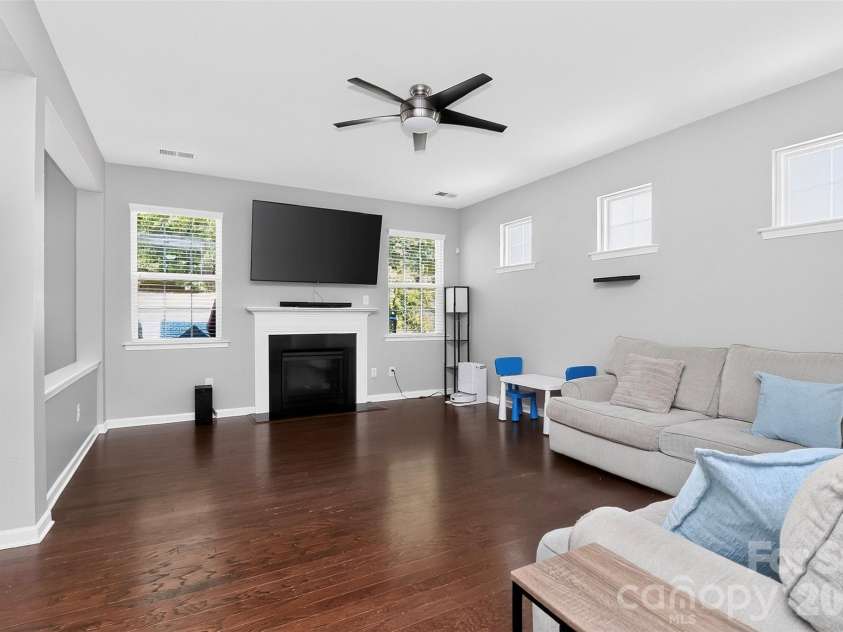 78066 Rillstone Drive, Lancaster, SC 29720.  MLS# CAR4431291, YatesRealty ID 55424. Living room with fireplace