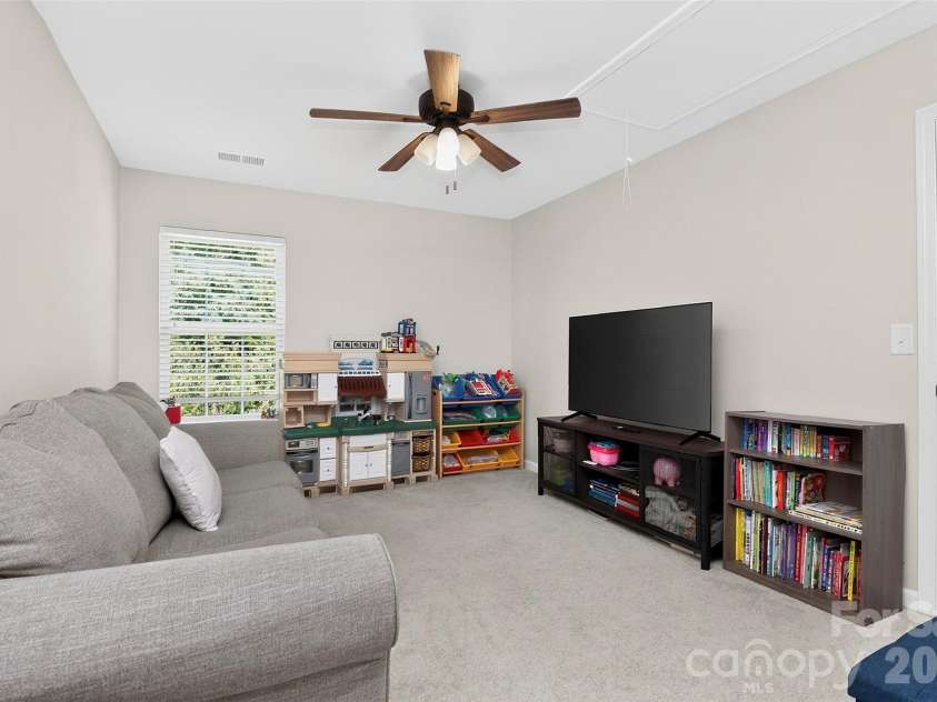 78066 Rillstone Drive, Lancaster, SC 29720.  MLS# CAR4431291, YatesRealty ID 55424. Loft upstairs with fan