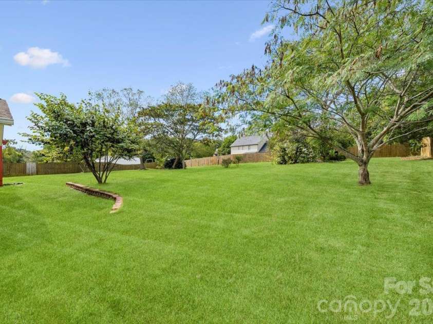 8544 Indian Summer Trail, Harrisburg, NC 28075.  MLS# CAR4431680, YatesRealty ID 55426. Backyard