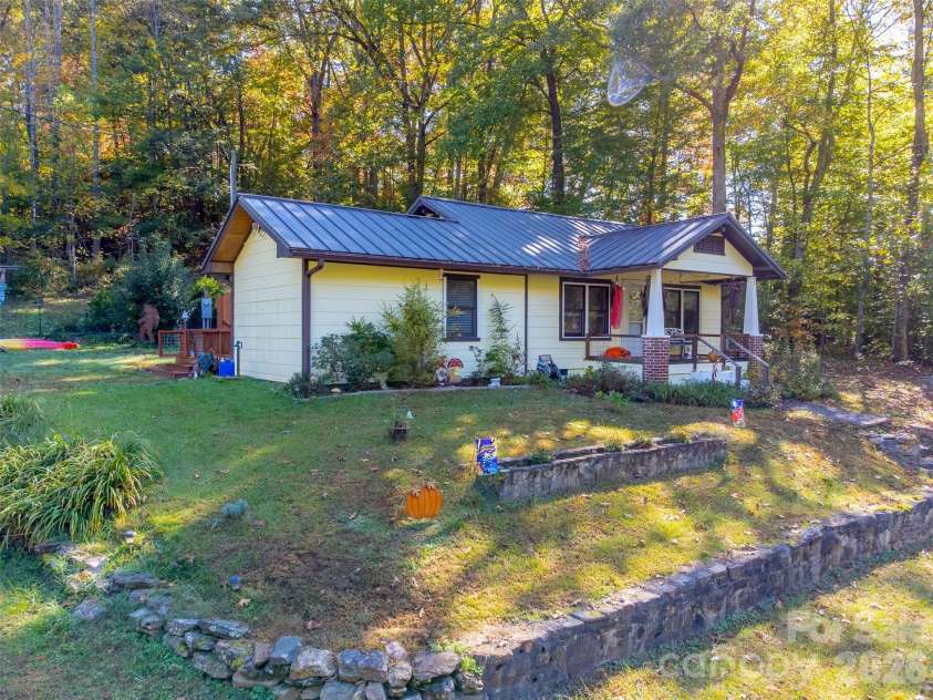 152 Mills Branch Road, Sylva, NC 28779.  MLS# CAR4430886, YatesRealty ID 55427. 