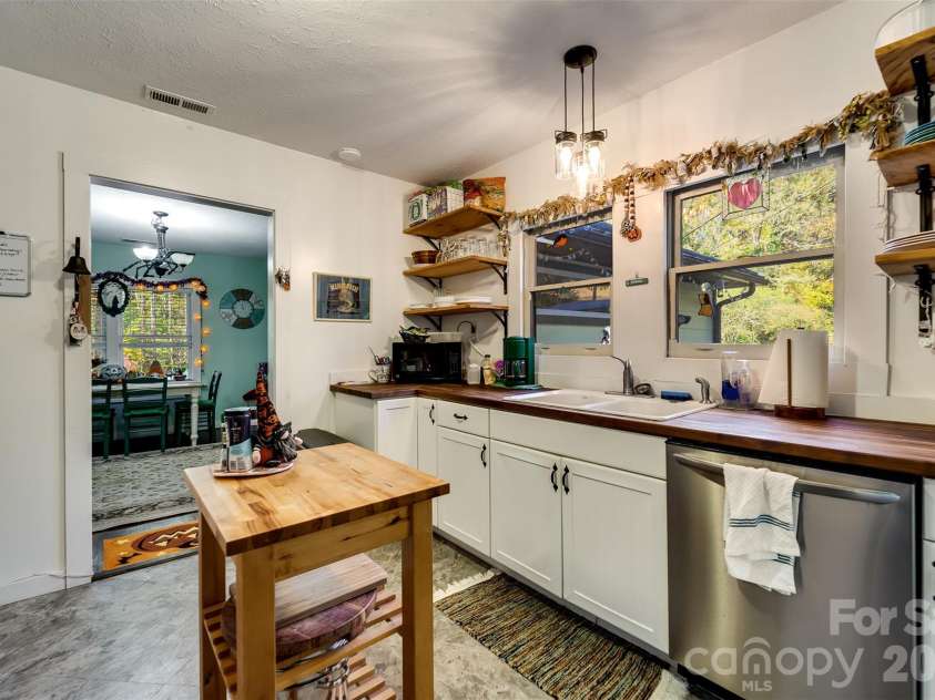 152 Mills Branch Road, Sylva, NC 28779.  MLS# CAR4430886, YatesRealty ID 55427. 