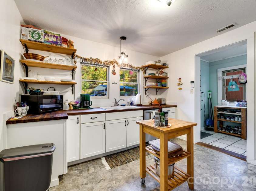 152 Mills Branch Road, Sylva, NC 28779.  MLS# CAR4430886, YatesRealty ID 55427. 