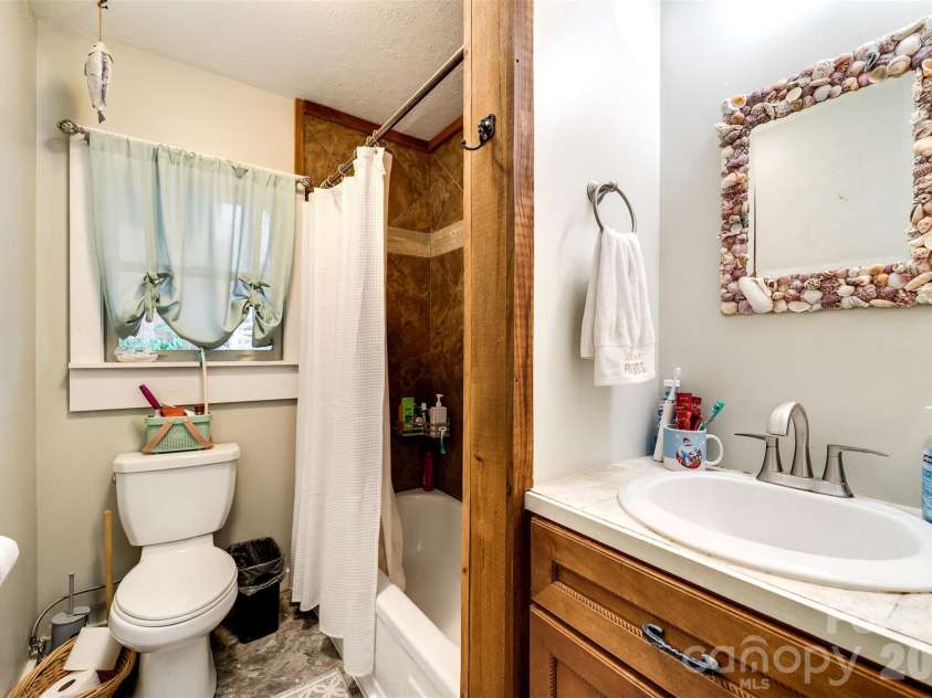 152 Mills Branch Road, Sylva, NC 28779.  MLS# CAR4430886, YatesRealty ID 55427. 