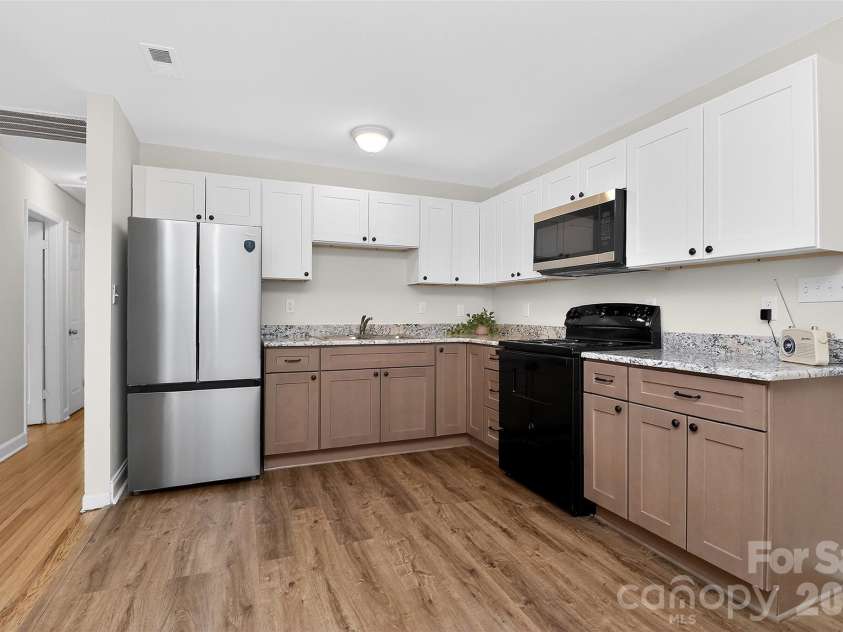 1234 Clanton Road, Charlotte, NC 28217.  MLS# CAR4356474, YatesRealty ID 5543. 