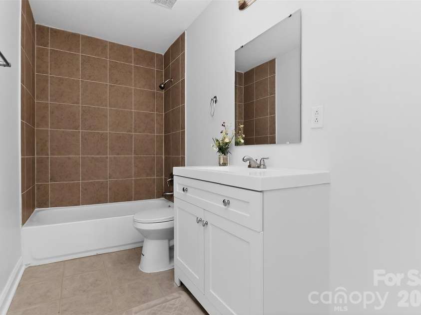1234 Clanton Road, Charlotte, NC 28217.  MLS# CAR4356474, YatesRealty ID 5543. Hallway Full Bath