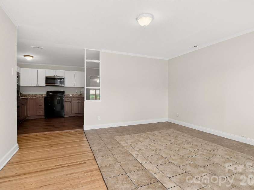 1234 Clanton Road, Charlotte, NC 28217.  MLS# CAR4356474, YatesRealty ID 5543. Living Room