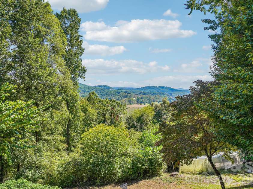 239 Bearwallow Mountain Road, Hendersonville, NC 28792.  MLS# CAR4430745, YatesRealty ID 55430. 