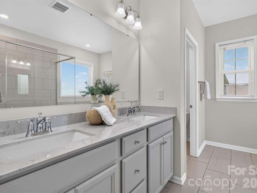 4638 Monument Valley Drive, Indian Land, SC 29707.  MLS# CAR4430010, YatesRealty ID 55436. Primary bathroom with dual-sink vanity,