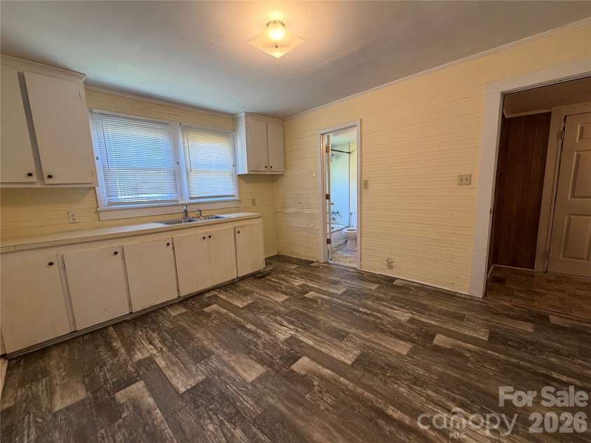 509 Denver Street, Kannapolis, NC 28083.  MLS# CAR4427629, YatesRealty ID 55447. Kitchen with bathroom and laundry attached