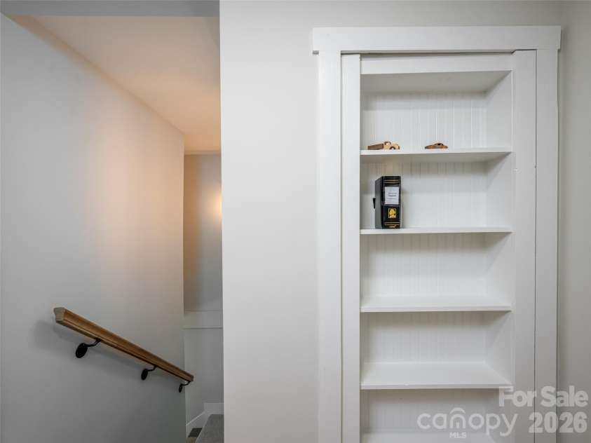 172 Reed Street, Canton, NC 28716.  MLS# CAR4296110, YatesRealty ID 5546. Bookcase/hidden door