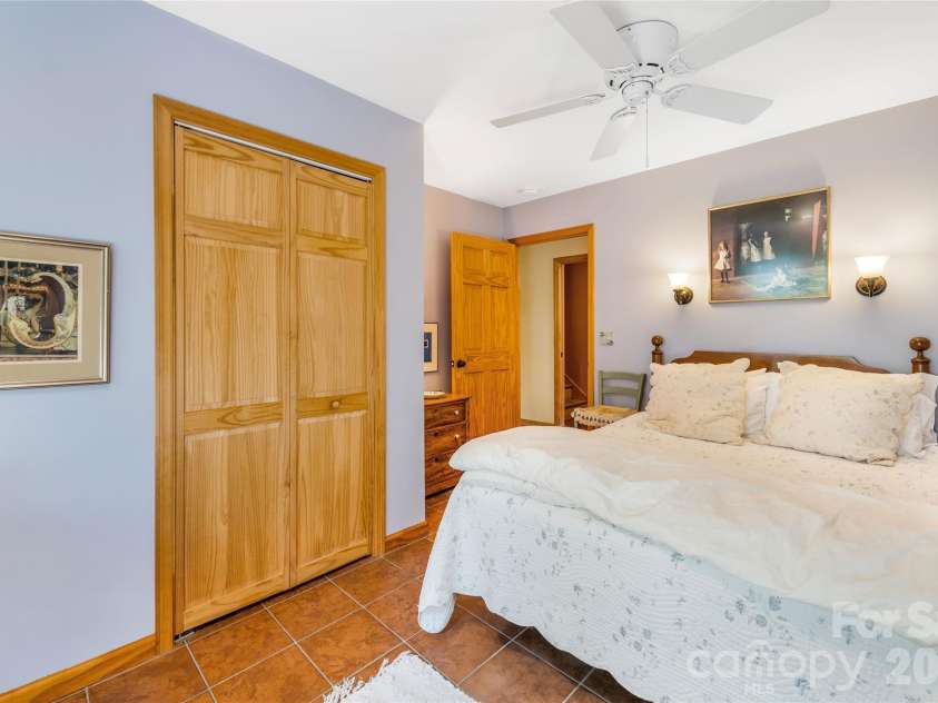 115 Laurel Wood Drive, Mars Hill, NC 28754.  MLS# CAR4431079, YatesRealty ID 55464. Downstairs bedroom.