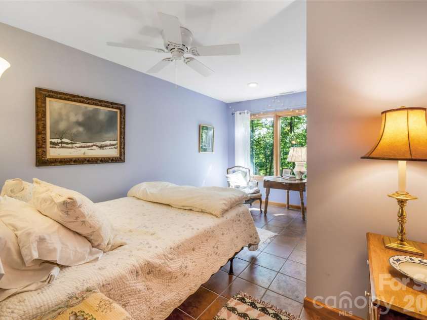 115 Laurel Wood Drive, Mars Hill, NC 28754.  MLS# CAR4431079, YatesRealty ID 55464. Lower level bedroom.