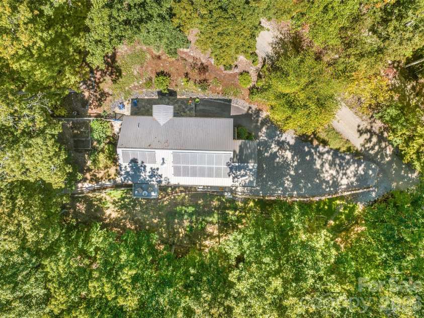 115 Laurel Wood Drive, Mars Hill, NC 28754.  MLS# CAR4431079, YatesRealty ID 55464. Solar panels keep energy bill very low.