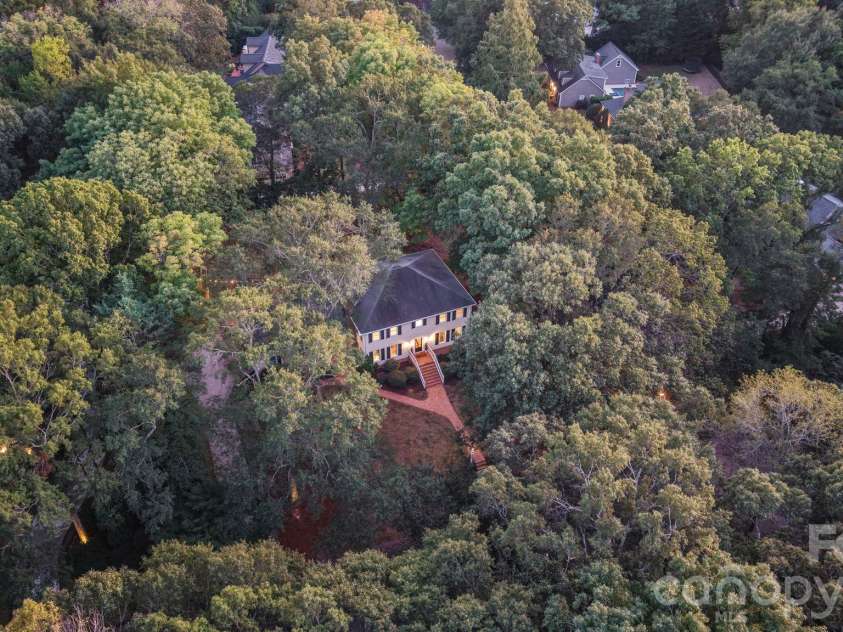 4800 Rockview Court, Charlotte, NC 28226.  MLS# CAR4431140, YatesRealty ID 55471. A Stunning Home at Sunset