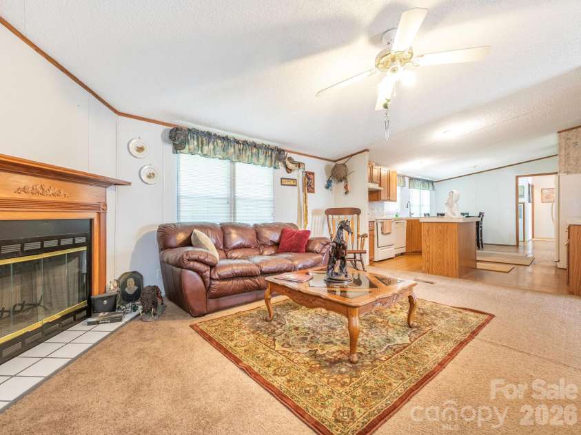 2292 Thornwell Road, Lancaster, SC 29720.  MLS# CAR4422898, YatesRealty ID 55474. Den Looking into Kitchen