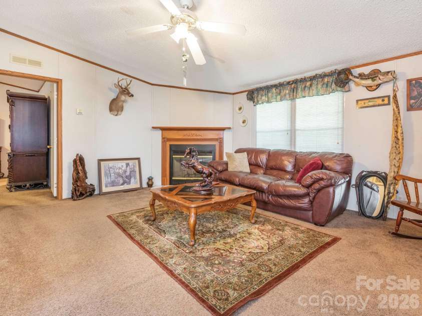 2292 Thornwell Road, Lancaster, SC 29720.  MLS# CAR4422898, YatesRealty ID 55474. Den with Fireplace