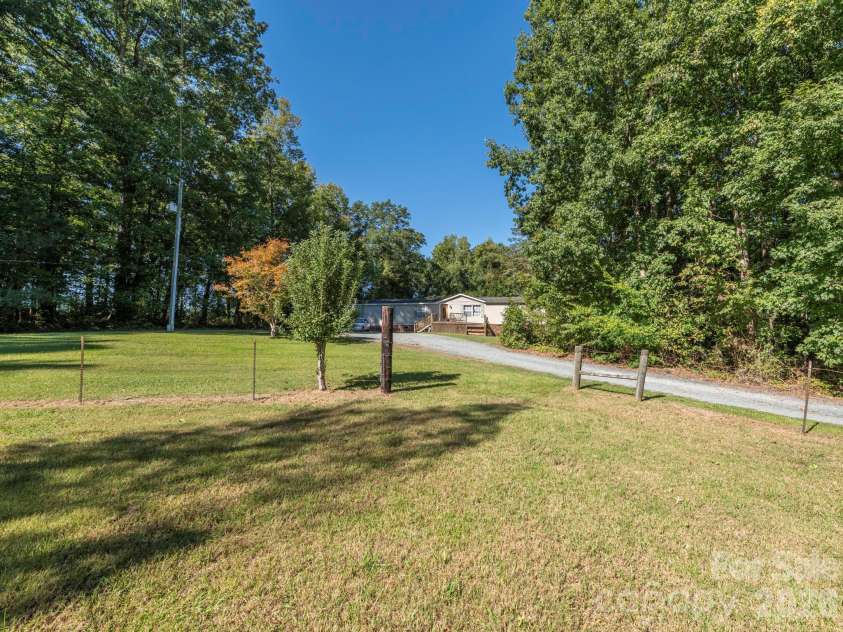 2292 Thornwell Road, Lancaster, SC 29720.  MLS# CAR4422898, YatesRealty ID 55474. Driveway, Surrounding Land and Approach